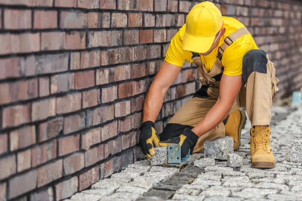 Landscaping team maintaining outdoor grounds and enhancing residential property curb appeal