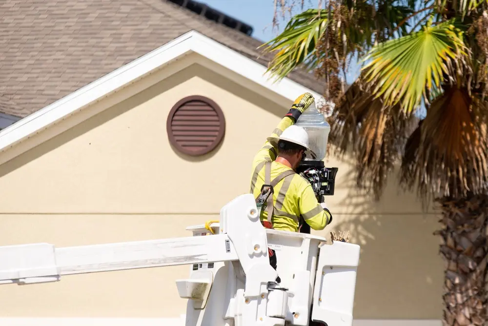 Handyman performing property maintenance and repair services for residential and commercial clients